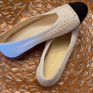 Chanel flats. Off white and black in color. Wore about  2 times